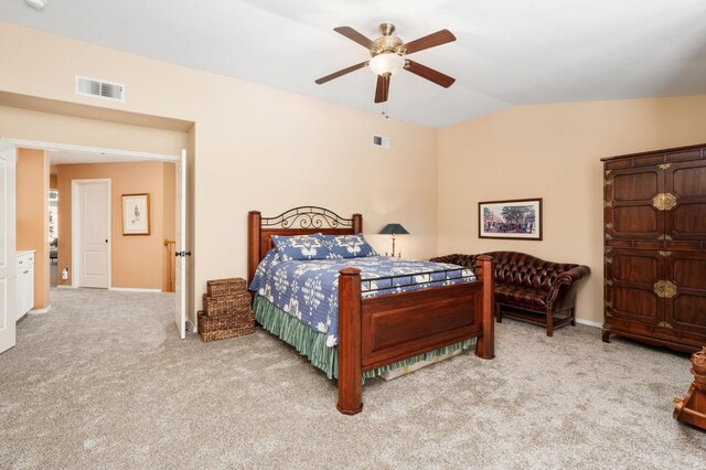 bedroom featuring carpet flooring, vaulted ceiling, baseboards, and ceiling fan