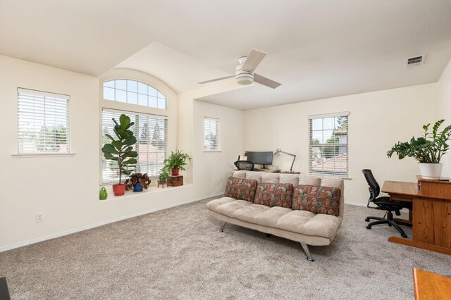 carpeted office with plenty of natural light, baseboards, lofted ceiling, and ceiling fan