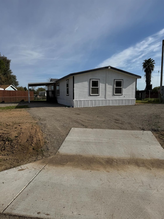 28640 Ward St, Madera, CA 93638 - manufactured / mobile home featuring fence and driveway