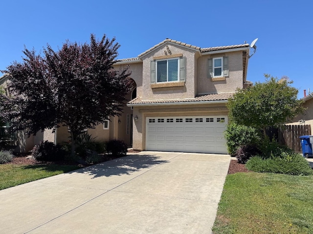 1822 N Magnolia, Clovis, CA 93619 - traditional home with a tiled roof, stucco siding, driveway, an attached garage, and fence
