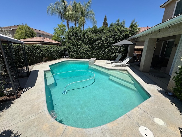 1822 N Magnolia, Clovis, CA 93619 - view of swimming pool with a patio and fence