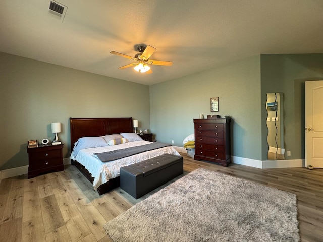 1822 N Magnolia, Clovis, CA 93619 - bedroom with light wood-style floors, baseboards, and a ceiling fan