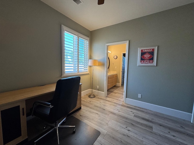 1822 N Magnolia, Clovis, CA 93619 - home office featuring light wood-type flooring, a ceiling fan, and baseboards