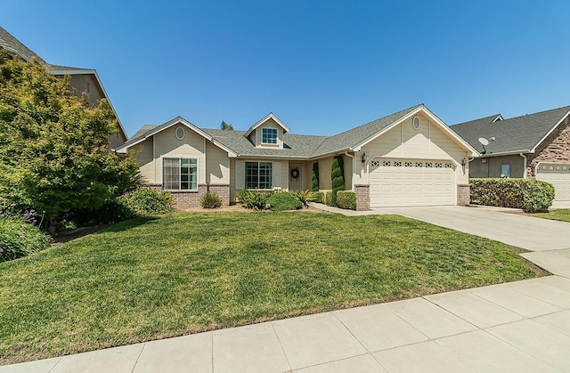 6588 E Lowe Ave, Fresno, CA 93727 - ranch-style house featuring brick siding, an attached garage, a front lawn, and concrete driveway
