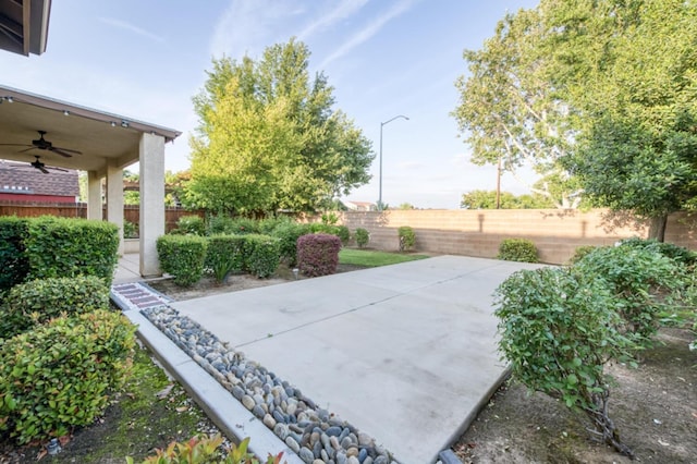 view of patio / terrace with ceiling fan and a fenced backyard