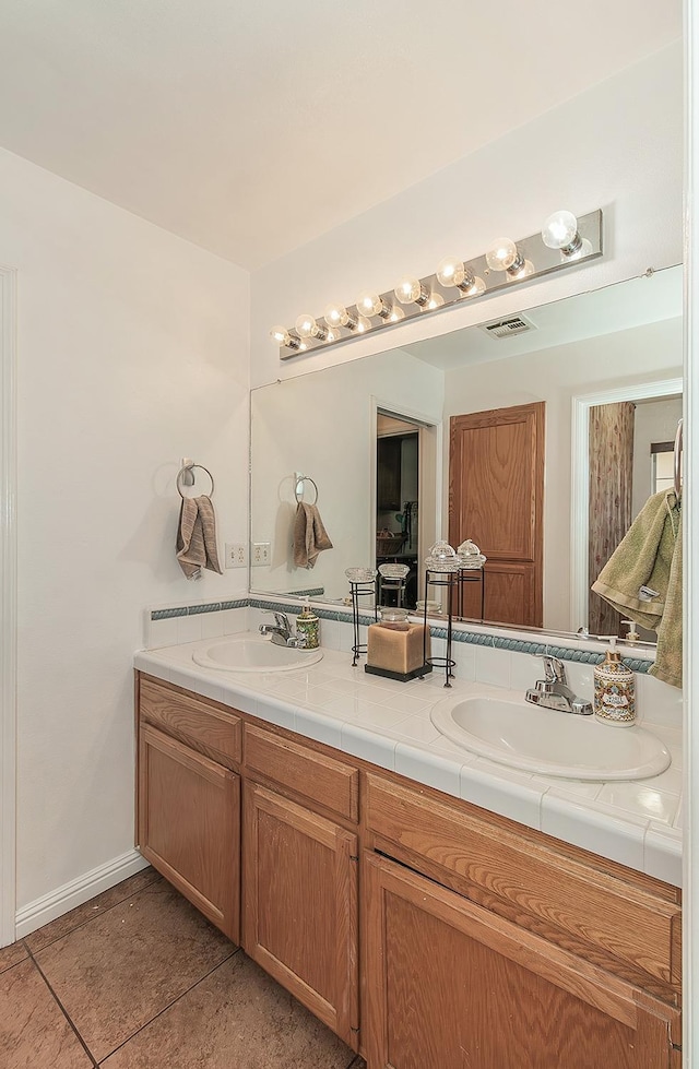 3042 Love St, Selma, CA 93662 - full bath featuring tile patterned floors and double vanity
