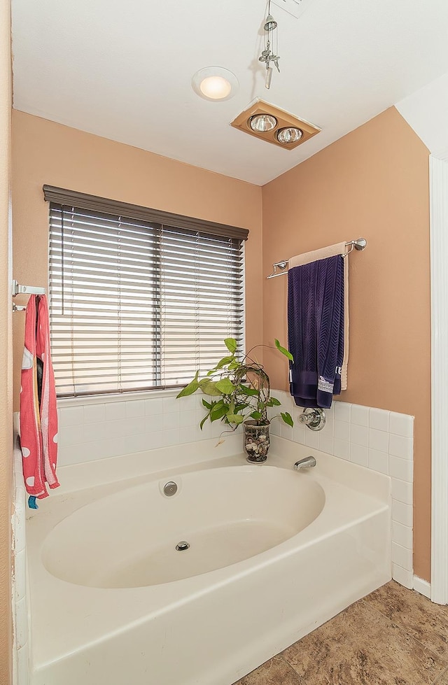 3042 Love St, Selma, CA 93662 - full bath featuring plenty of natural light and a garden tub