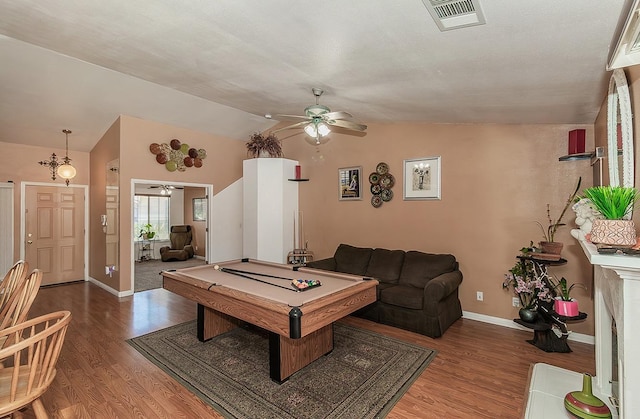 3042 Love St, Selma, CA 93662 - rec room with a ceiling fan, wood finished floors, billiards, and vaulted ceiling