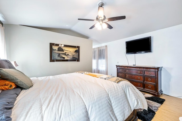 2371 Sophia Ln, Kingsburg, CA 93631 - bedroom with lofted ceiling, wood finished floors, and ceiling fan