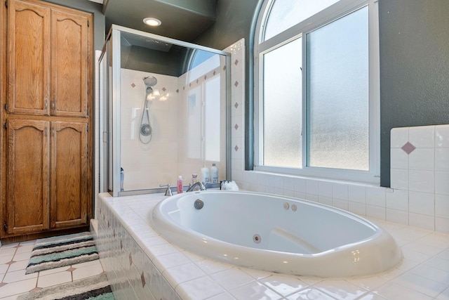 2371 Sophia Ln, Kingsburg, CA 93631 - bathroom with a shower stall, a tub with jets, and tile patterned floors
