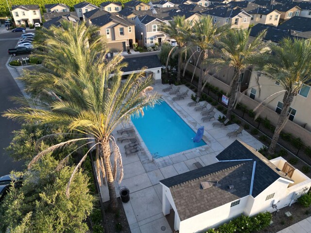 6458 E Riesling Dr, Fresno, CA 93727 - community pool featuring a residential view, a patio, and fence
