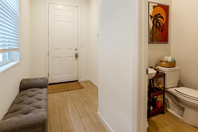 6458 E Riesling Dr, Fresno, CA 93727 - entrance foyer with light wood finished floors and baseboards