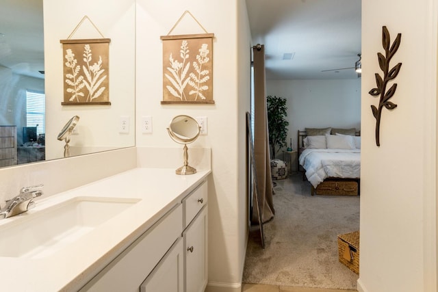6458 E Riesling Dr, Fresno, CA 93727 - bathroom with vanity and connected bathroom