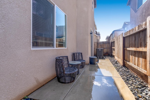 6458 E Riesling Dr, Fresno, CA 93727 - view of home's exterior featuring stucco siding, a patio, and a fenced backyard