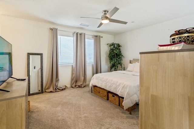 6458 E Riesling Dr, Fresno, CA 93727 - bedroom featuring light colored carpet and a ceiling fan