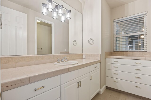 2758 N Highland Ave, Fresno, CA 93737 - bathroom with tile patterned flooring and vanity