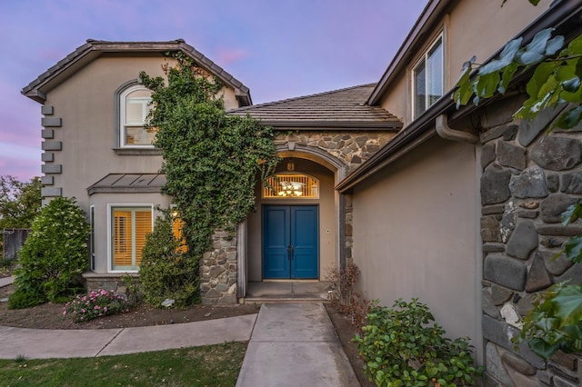 2758 N Highland Ave, Fresno, CA 93737 - view of exterior entry with stone siding and stucco siding