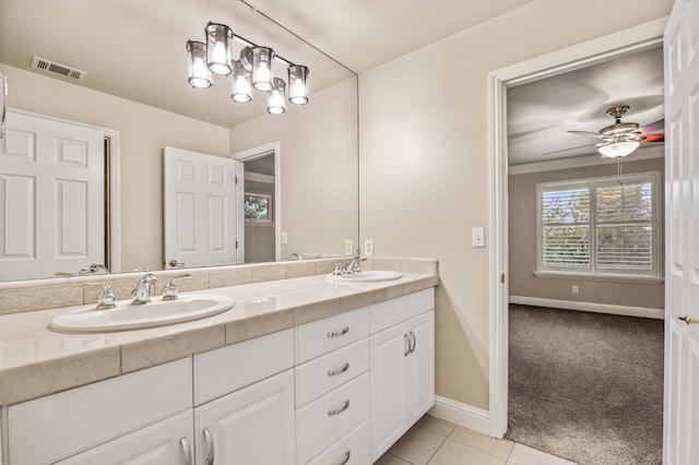 2758 N Highland Ave, Fresno, CA 93737 - full bathroom featuring baseboards, double vanity, tile patterned floors, ceiling fan, and ornamental molding