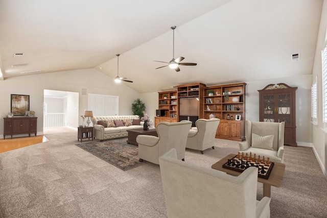 2758 N Highland Ave, Fresno, CA 93737 - living room with light colored carpet, ceiling fan, and high vaulted ceiling