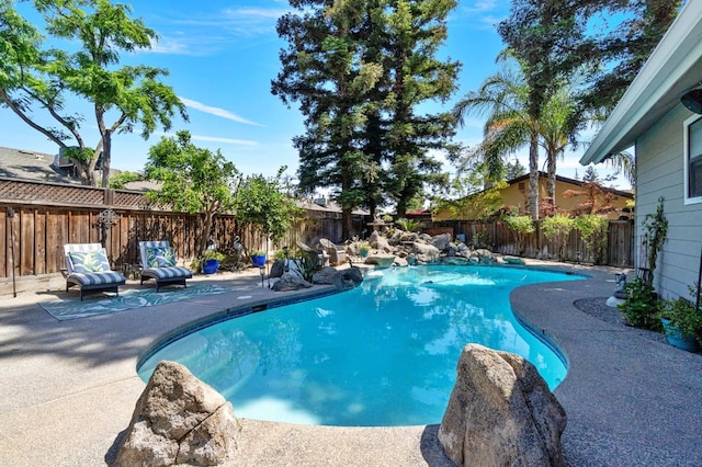 1517 W Fir Ave, Fresno, CA 93711 - view of swimming pool featuring a fenced backyard and a patio