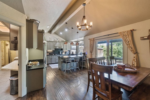 1517 W Fir Ave, Fresno, CA 93711 - dining space with a chandelier and dark wood-style flooring