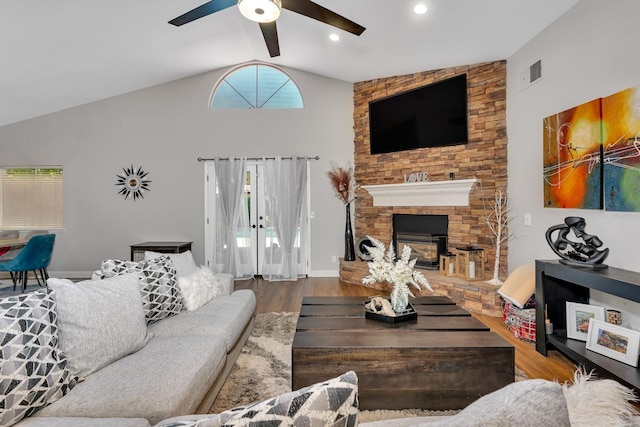 22 Pointe W, Madera, CA 93637 - living area with ceiling fan, wood finished floors, high vaulted ceiling, and a stone fireplace