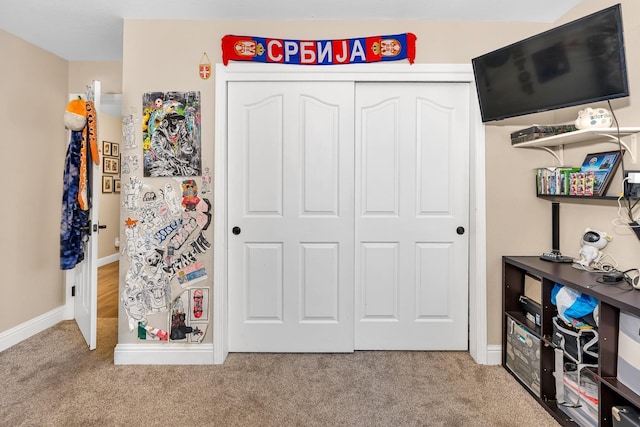 22 Pointe W, Madera, CA 93637 - carpeted bedroom featuring a closet and baseboards