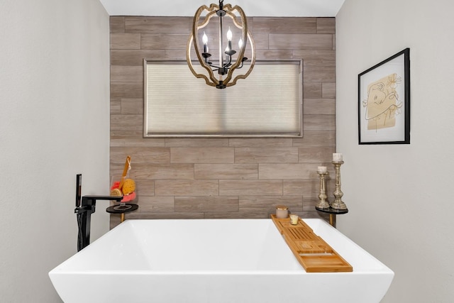 22 Pointe W, Madera, CA 93637 - full bath featuring a chandelier and a freestanding tub