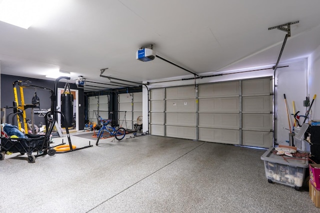 22 Pointe W, Madera, CA 93637 - garage featuring a garage door opener