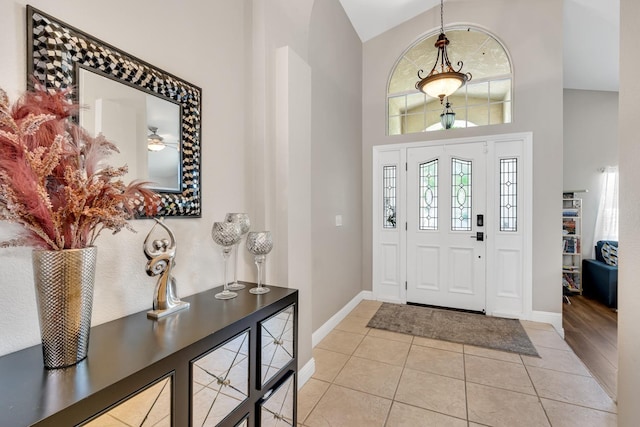 22 Pointe W, Madera, CA 93637 - foyer entrance featuring baseboards, a high ceiling, and tile patterned floors