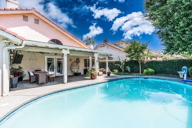22 Pointe W, Madera, CA 93637 - view of pool featuring french doors, a patio, and a fenced backyard