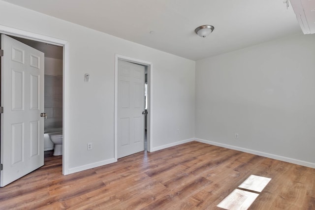 1197 Pucheu St, Mendota, CA 93640 - unfurnished bedroom with baseboards and light wood finished floors