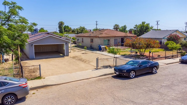 1197 Pucheu St, Mendota, CA 93640 - ranch-style home with a garage and driveway