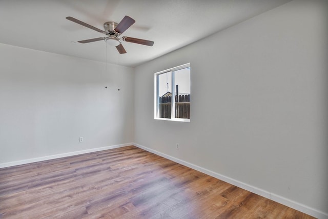 1197 Pucheu St, Mendota, CA 93640 - spare room with baseboards, wood finished floors, and ceiling fan