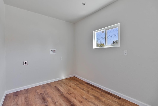 1197 Pucheu St, Mendota, CA 93640 - washroom with hookup for a washing machine, hookup for an electric dryer, baseboards, and wood finished floors