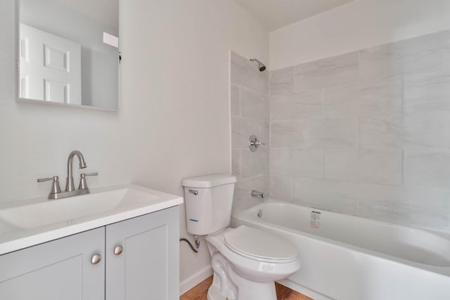 1197 Pucheu St, Mendota, CA 93640 - bathroom with toilet, vanity, shower / washtub combination, and wood finished floors