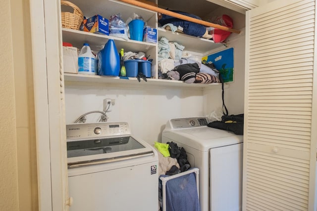 washroom with separate washer and dryer