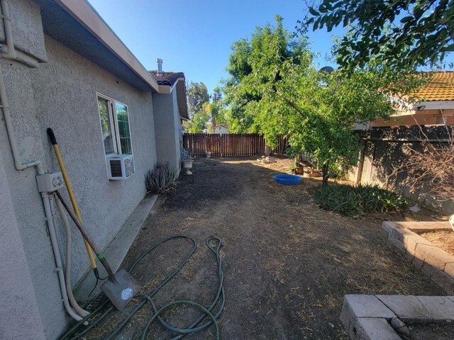 5566 W Fir Ave, Fresno, CA 93722 - view of yard featuring fence