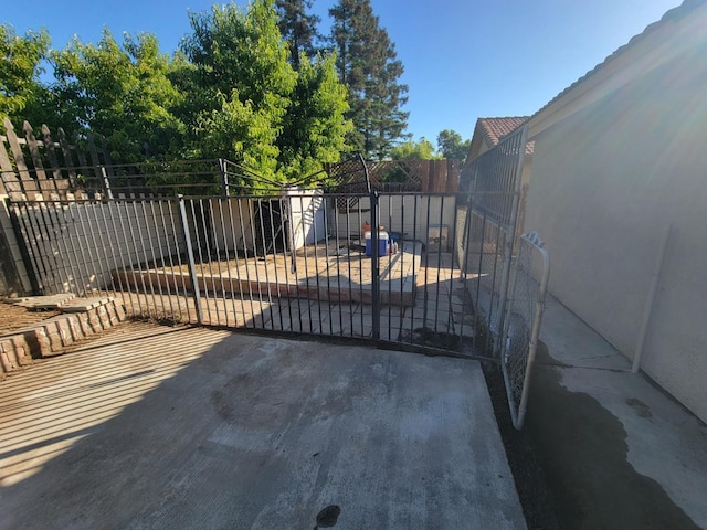 5566 W Fir Ave, Fresno, CA 93722 - gate featuring fence