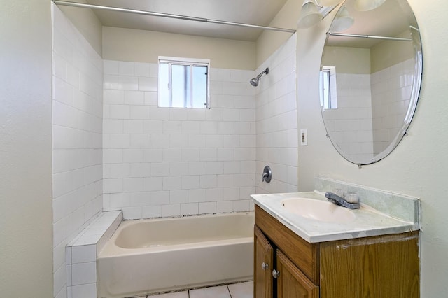 full bathroom with shower / bathtub combination, vanity, and tile patterned flooring