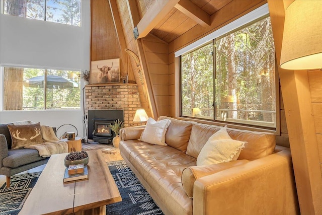 30830 Old Strawberry Rd, Tuolumne, CA 95375 - living area featuring plenty of natural light, wood walls, and wood ceiling