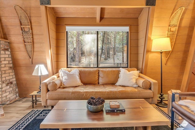 30830 Old Strawberry Rd, Tuolumne, CA 95375 - living area with wood walls, wood finished floors, and beamed ceiling