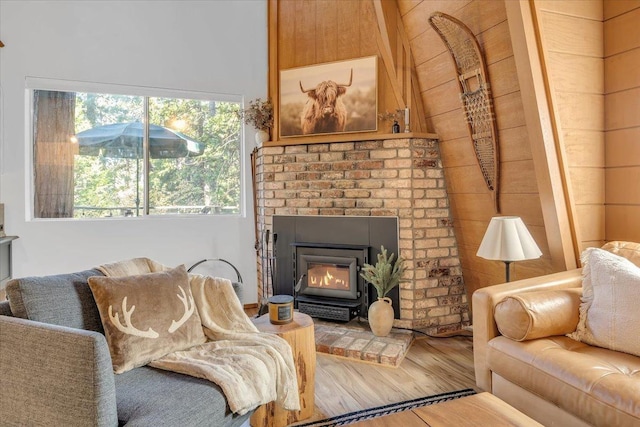 30830 Old Strawberry Rd, Tuolumne, CA 95375 - living area featuring wood finished floors and a brick fireplace