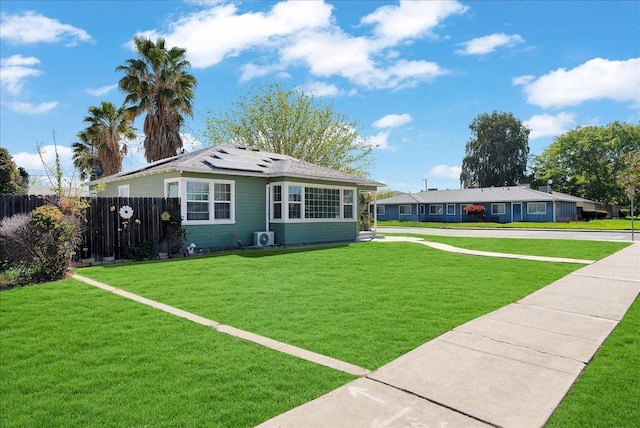 view of front of property with solar panels