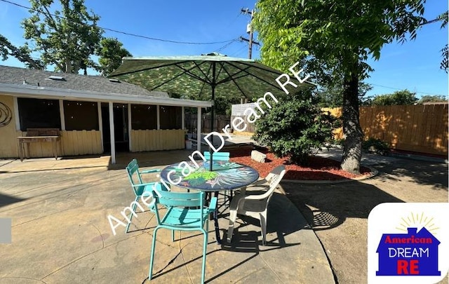 view of patio / terrace with fence