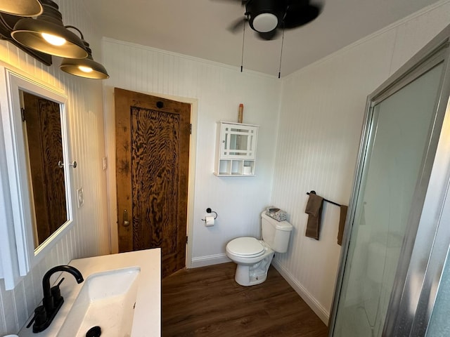 1441 N Calaveras St, Fresno, CA 93728 - full bath with wood finished floors, a ceiling fan, a shower with shower door, and vanity