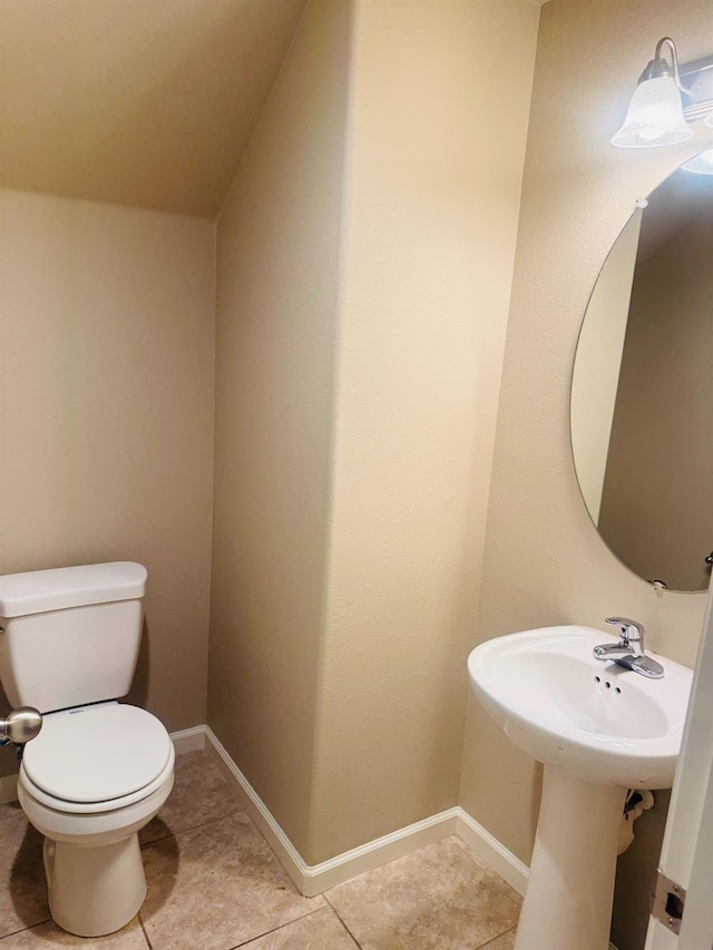 3673 Artistry Way, Clovis, CA 93619 - half bathroom featuring toilet, tile patterned flooring, and baseboards