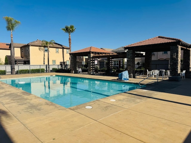 3673 Artistry Way, Clovis, CA 93619 - community pool featuring a gazebo, fence, a patio, and a residential view
