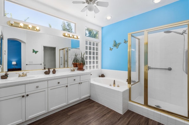 10597 E Fieldstone Ave, Clovis, CA 93619 - full bath with a stall shower, a ceiling fan, a bath, and double vanity