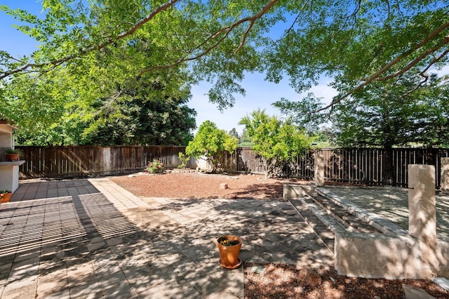 10597 E Fieldstone Ave, Clovis, CA 93619 - fenced backyard with a patio